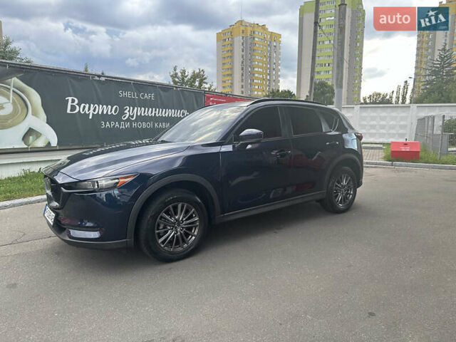 Синий Мазда СХ-5, объемом двигателя 2.49 л и пробегом 112 тыс. км за 22000 $, фото 1 на Automoto.ua