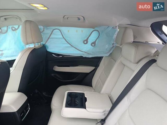 Синий Мазда СХ-5, объемом двигателя 2.5 л и пробегом 107 тыс. км за 11000 $, фото 5 на Automoto.ua