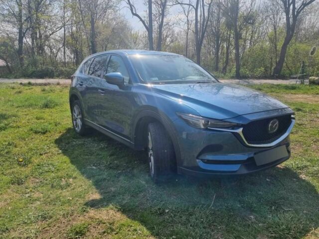 Синий Мазда СХ-5, объемом двигателя 2.5 л и пробегом 48 тыс. км за 15000 $, фото 1 на Automoto.ua