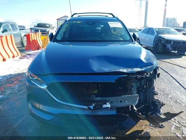 Синий Мазда СХ-5, объемом двигателя 2.5 л и пробегом 104 тыс. км за 13900 $, фото 1 на Automoto.ua