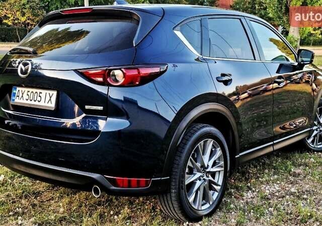 Синий Мазда СХ-5, объемом двигателя 2.49 л и пробегом 106 тыс. км за 23500 $, фото 5 на Automoto.ua