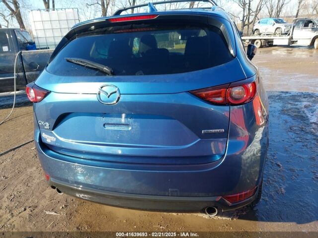 Синий Мазда СХ-5, объемом двигателя 2.5 л и пробегом 104 тыс. км за 13900 $, фото 4 на Automoto.ua