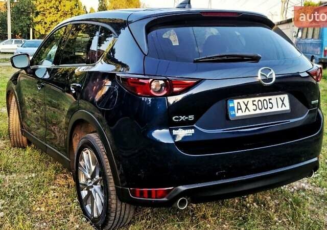 Синий Мазда СХ-5, объемом двигателя 2.49 л и пробегом 106 тыс. км за 23500 $, фото 3 на Automoto.ua