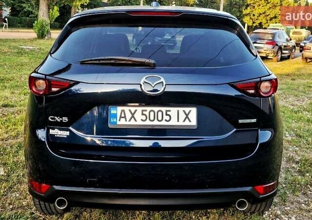 Синий Мазда СХ-5, объемом двигателя 2.49 л и пробегом 106 тыс. км за 23500 $, фото 4 на Automoto.ua