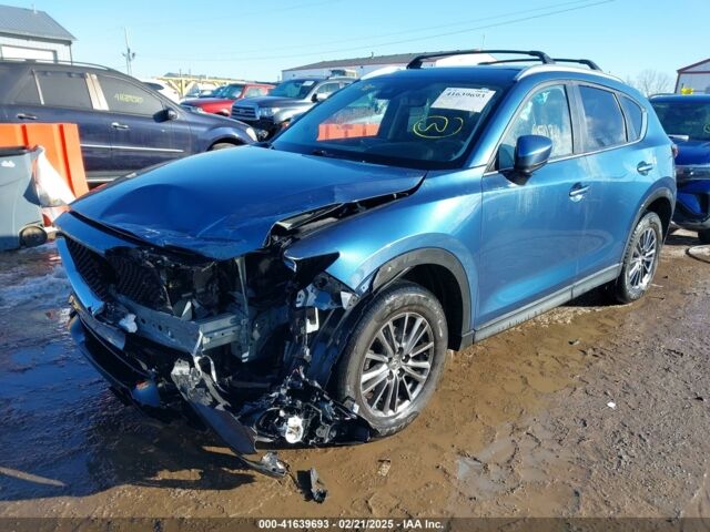 Синий Мазда СХ-5, объемом двигателя 2.5 л и пробегом 104 тыс. км за 13900 $, фото 2 на Automoto.ua