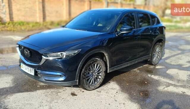 Синий Мазда СХ-5, объемом двигателя 2.49 л и пробегом 46 тыс. км за 22500 $, фото 4 на Automoto.ua