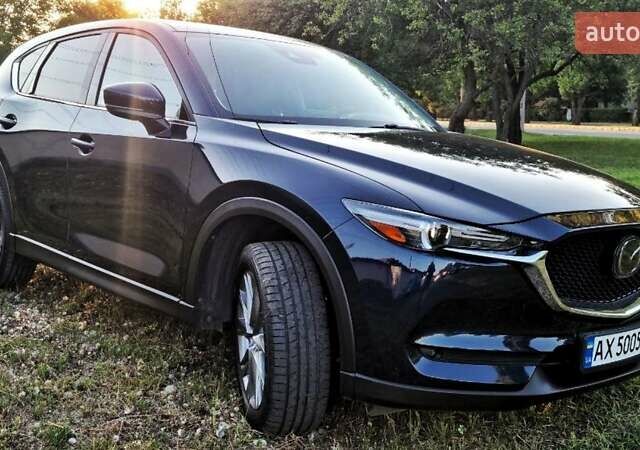 Синий Мазда СХ-5, объемом двигателя 2.49 л и пробегом 106 тыс. км за 23500 $, фото 2 на Automoto.ua