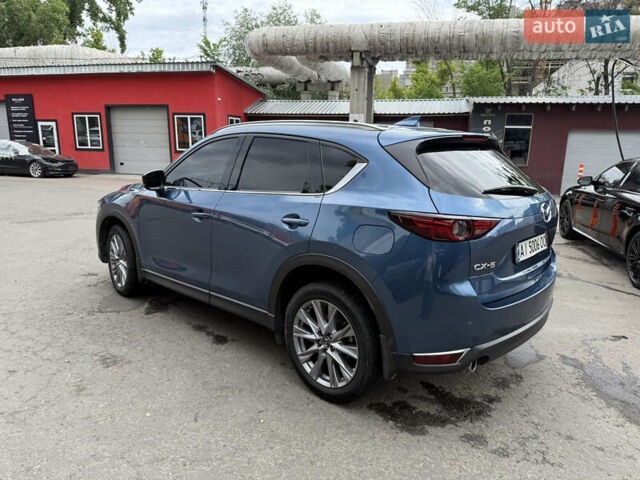 Синий Мазда СХ-5, объемом двигателя 2.49 л и пробегом 75 тыс. км за 21999 $, фото 1 на Automoto.ua