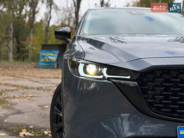 Синий Мазда СХ-5, объемом двигателя 2.49 л и пробегом 46 тыс. км за 25000 $, фото 2 на Automoto.ua