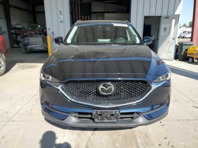 Синий Мазда СХ-5, объемом двигателя 2.5 л и пробегом 81 тыс. км за 4700 $, фото 4 на Automoto.ua