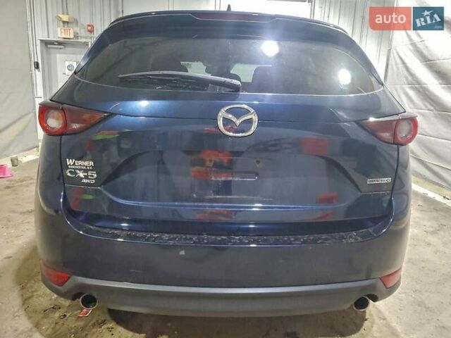 Синий Мазда СХ-5, объемом двигателя 2.49 л и пробегом 110 тыс. км за 5500 $, фото 5 на Automoto.ua