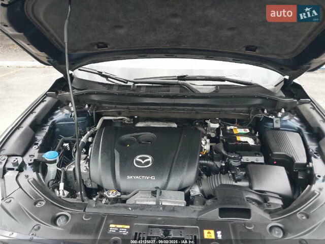 Синий Мазда СХ-5, объемом двигателя 2.49 л и пробегом 100 тыс. км за 6000 $, фото 11 на Automoto.ua