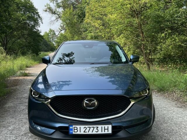 Синий Мазда СХ-5, объемом двигателя 2.5 л и пробегом 125 тыс. км за 20000 $, фото 1 на Automoto.ua