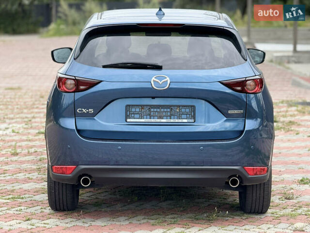 Синій Мазда СХ-5, об'ємом двигуна 2 л та пробігом 72 тис. км за 23900 $, фото 4 на Automoto.ua