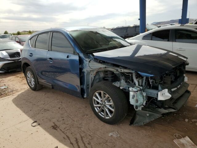 Синий Мазда СХ-5, объемом двигателя 2.5 л и пробегом 47 тыс. км за 17500 $, фото 2 на Automoto.ua