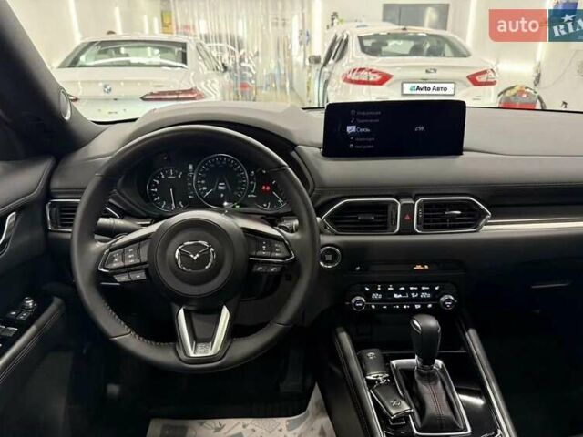 Синий Мазда СХ-5, объемом двигателя 2.49 л и пробегом 16 тыс. км за 23300 $, фото 9 на Automoto.ua