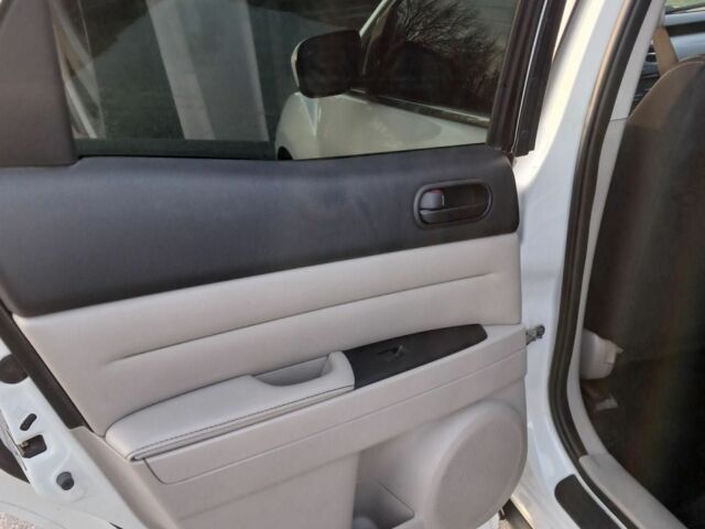 Білий Мазда СХ-7, об'ємом двигуна 2.5 л та пробігом 247 тис. км за 9300 $, фото 13 на Automoto.ua