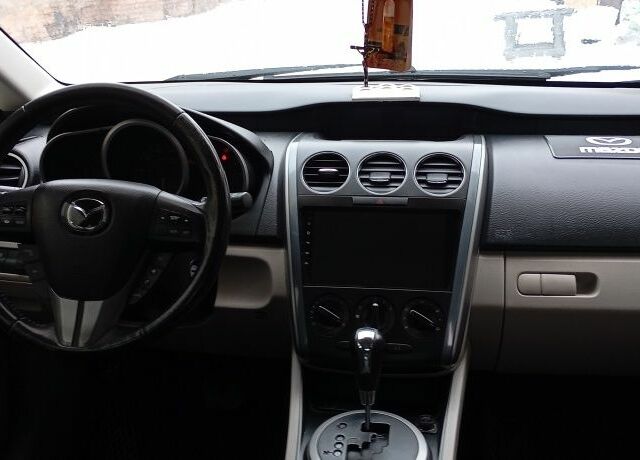 Белый Мазда СХ-7, объемом двигателя 2.5 л и пробегом 286 тыс. км за 10200 $, фото 4 на Automoto.ua