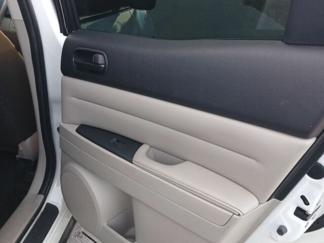 Білий Мазда СХ-7, об'ємом двигуна 2.5 л та пробігом 247 тис. км за 9300 $, фото 12 на Automoto.ua