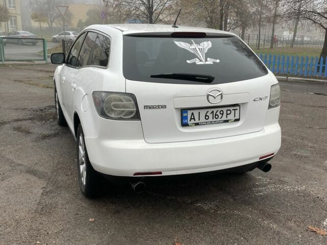 Білий Мазда СХ-7, об'ємом двигуна 2.3 л та пробігом 200 тис. км за 5600 $, фото 4 на Automoto.ua