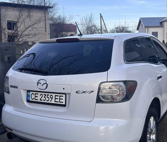 Белый Мазда СХ-7, объемом двигателя 2.3 л и пробегом 176 тыс. км за 7200 $, фото 4 на Automoto.ua