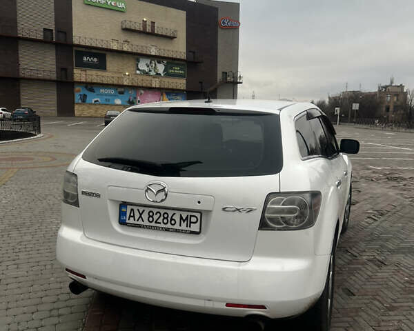 Белый Мазда СХ-7, объемом двигателя 2.26 л и пробегом 181 тыс. км за 7500 $, фото 5 на Automoto.ua