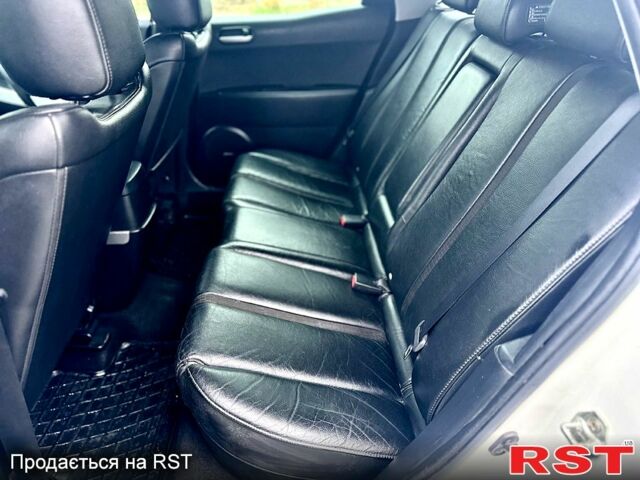 Белый Мазда СХ-7, объемом двигателя 2.3 л и пробегом 190 тыс. км за 7850 $, фото 4 на Automoto.ua