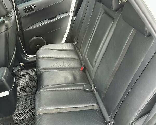 Белый Мазда СХ-7, объемом двигателя 2.26 л и пробегом 235 тыс. км за 7500 $, фото 5 на Automoto.ua