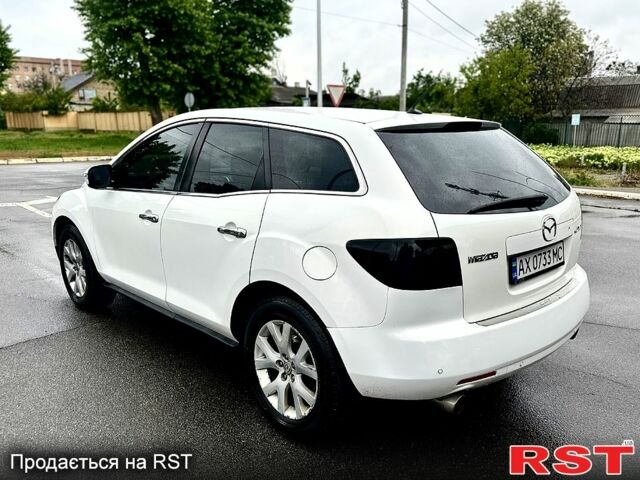 Белый Мазда СХ-7, объемом двигателя 2.3 л и пробегом 190 тыс. км за 7850 $, фото 1 на Automoto.ua