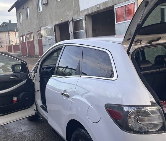 Белый Мазда СХ-7, объемом двигателя 2.3 л и пробегом 176 тыс. км за 7200 $, фото 2 на Automoto.ua