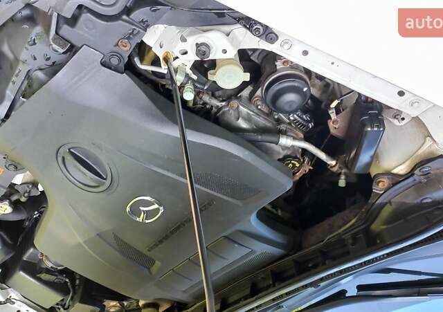 Белый Мазда СХ-7, объемом двигателя 2.3 л и пробегом 206 тыс. км за 7400 $, фото 10 на Automoto.ua