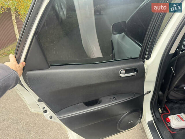 Білий Мазда СХ-7, об'ємом двигуна 2.26 л та пробігом 179 тис. км за 5400 $, фото 13 на Automoto.ua