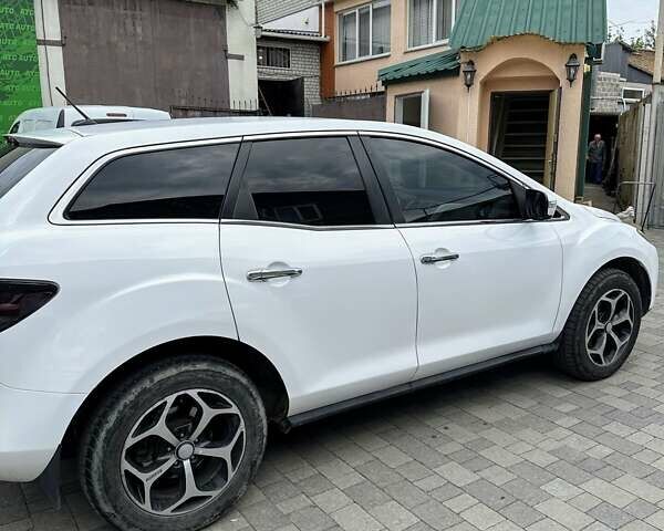 Белый Мазда СХ-7, объемом двигателя 2.26 л и пробегом 235 тыс. км за 7500 $, фото 2 на Automoto.ua