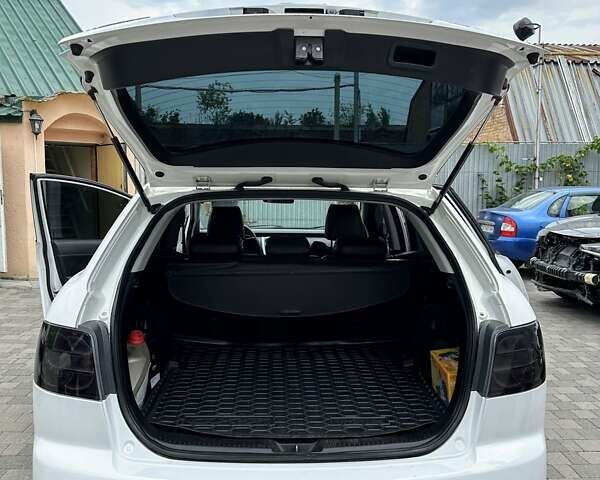 Белый Мазда СХ-7, объемом двигателя 2.26 л и пробегом 235 тыс. км за 7500 $, фото 1 на Automoto.ua