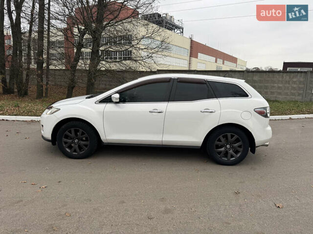 Белый Мазда СХ-7, объемом двигателя 2.3 л и пробегом 297 тыс. км за 4500 $, фото 3 на Automoto.ua