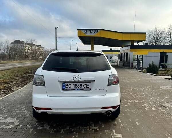 Білий Мазда СХ-7, об'ємом двигуна 2.2 л та пробігом 228 тис. км за 10000 $, фото 8 на Automoto.ua