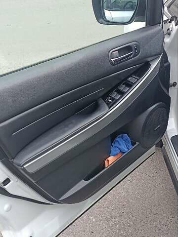 Белый Мазда СХ-7, объемом двигателя 2.26 л и пробегом 193 тыс. км за 8500 $, фото 22 на Automoto.ua