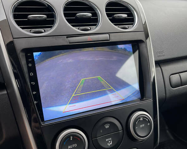 Белый Мазда СХ-7, объемом двигателя 2.2 л и пробегом 225 тыс. км за 9999 $, фото 22 на Automoto.ua