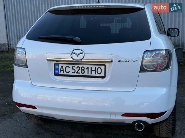 Белый Мазда СХ-7, объемом двигателя 2.2 л и пробегом 180 тыс. км за 11000 $, фото 4 на Automoto.ua