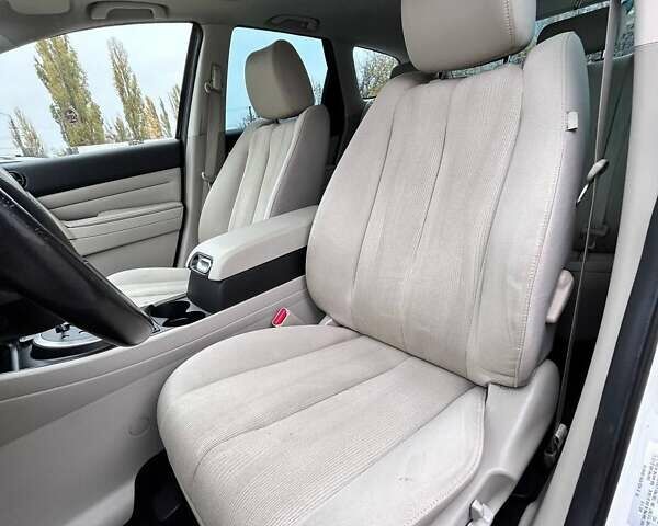 Білий Мазда СХ-7, об'ємом двигуна 2.5 л та пробігом 165 тис. км за 8700 $, фото 14 на Automoto.ua