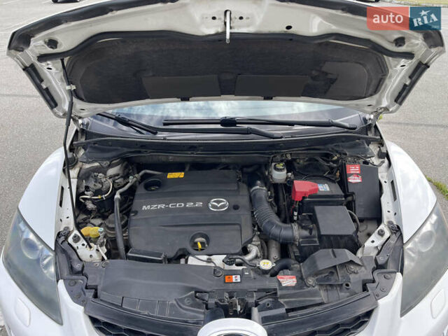 Белый Мазда СХ-7, объемом двигателя 2.2 л и пробегом 225 тыс. км за 9999 $, фото 19 на Automoto.ua