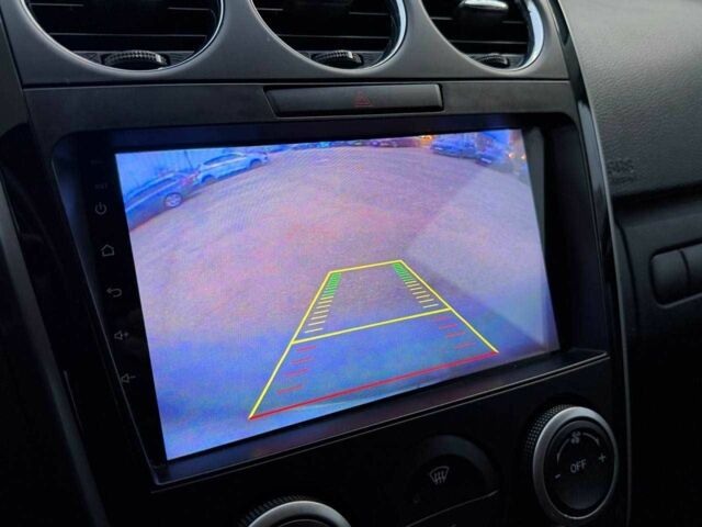 Білий Мазда СХ-7, об'ємом двигуна 2.2 л та пробігом 226 тис. км за 9690 $, фото 21 на Automoto.ua