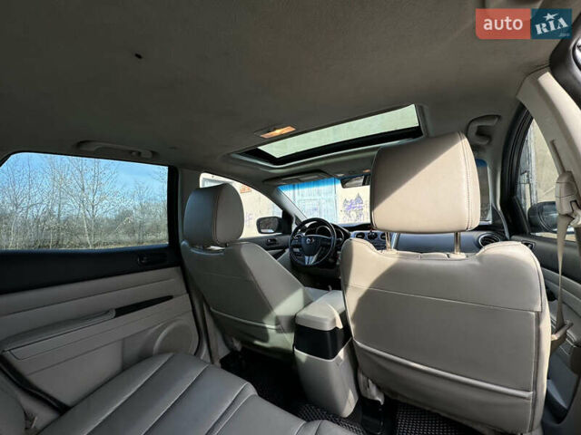 Білий Мазда СХ-7, об'ємом двигуна 2.49 л та пробігом 350 тис. км за 8200 $, фото 38 на Automoto.ua