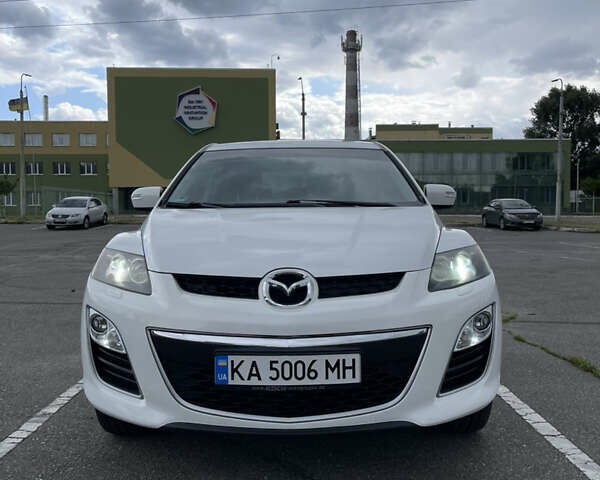 Белый Мазда СХ-7, объемом двигателя 2.2 л и пробегом 225 тыс. км за 9999 $, фото 16 на Automoto.ua