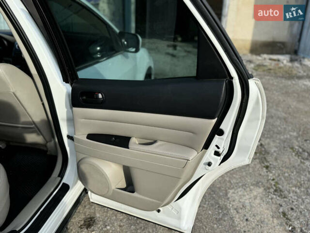 Білий Мазда СХ-7, об'ємом двигуна 2.49 л та пробігом 350 тис. км за 8200 $, фото 37 на Automoto.ua