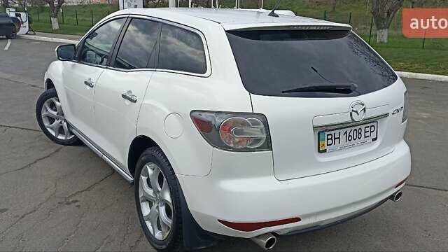 Белый Мазда СХ-7, объемом двигателя 2.26 л и пробегом 193 тыс. км за 8500 $, фото 45 на Automoto.ua