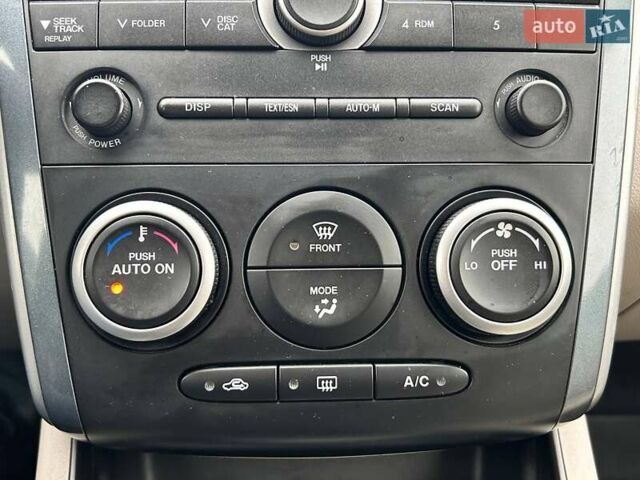 Білий Мазда СХ-7, об'ємом двигуна 2.5 л та пробігом 165 тис. км за 8700 $, фото 23 на Automoto.ua