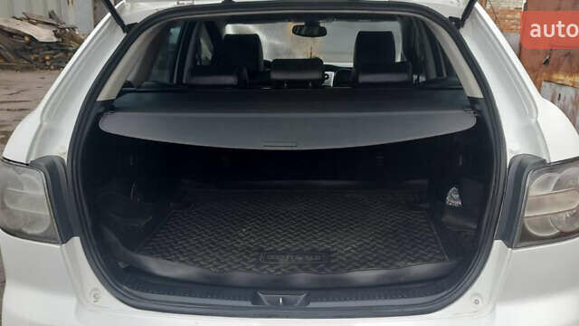 Белый Мазда СХ-7, объемом двигателя 2.26 л и пробегом 165 тыс. км за 8700 $, фото 17 на Automoto.ua