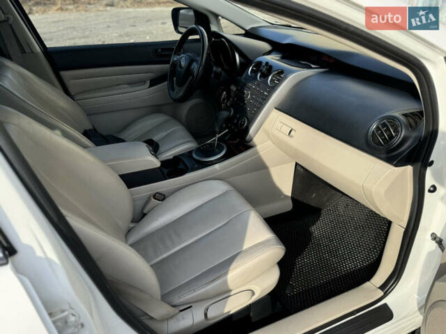 Білий Мазда СХ-7, об'ємом двигуна 2.49 л та пробігом 350 тис. км за 8200 $, фото 28 на Automoto.ua