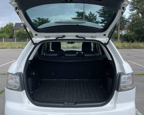 Белый Мазда СХ-7, объемом двигателя 2.2 л и пробегом 225 тыс. км за 9999 $, фото 14 на Automoto.ua